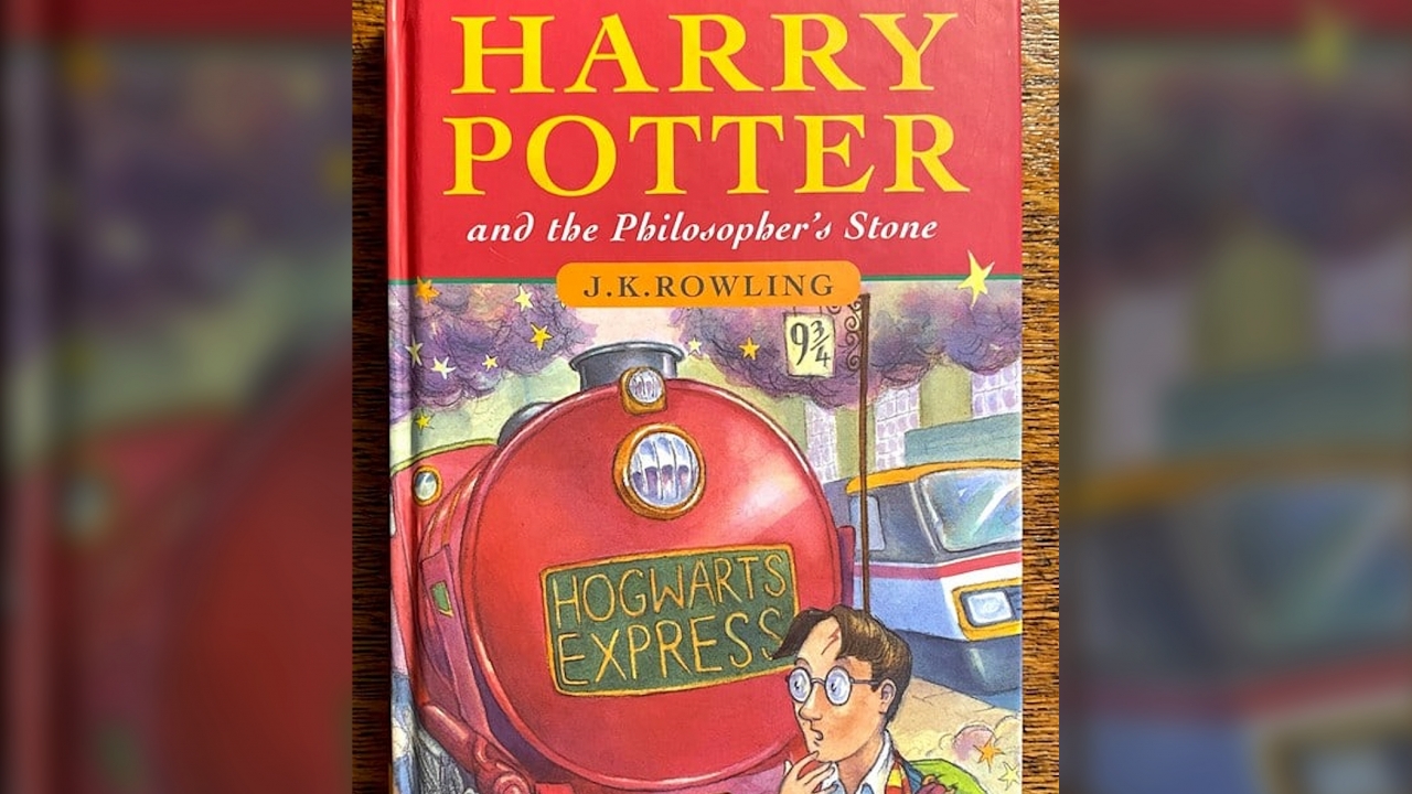 A first-edition "Harry Potter and the Philosopher's Stone" is shown.