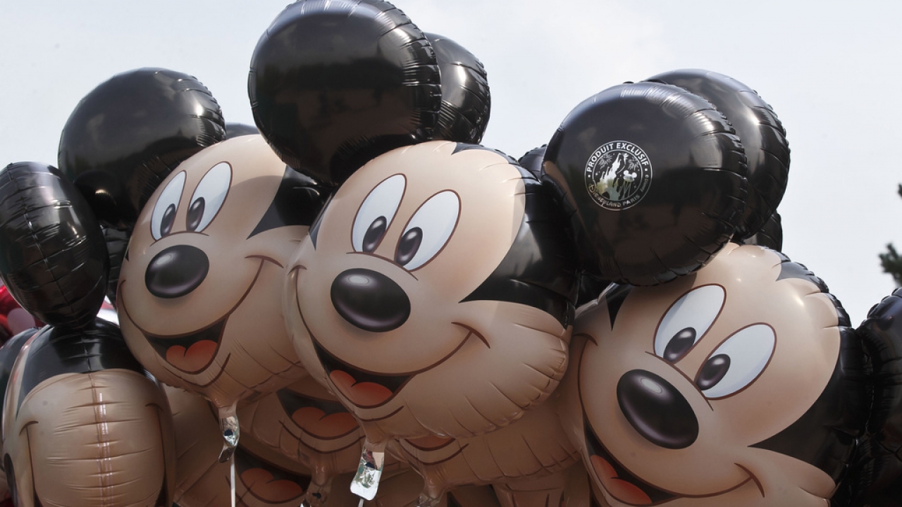 Mickey Mouse balloons appear at Disneyland Paris.