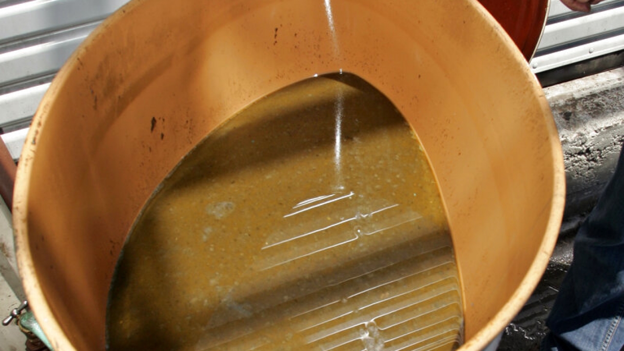 A damaged drum with cooking oils.