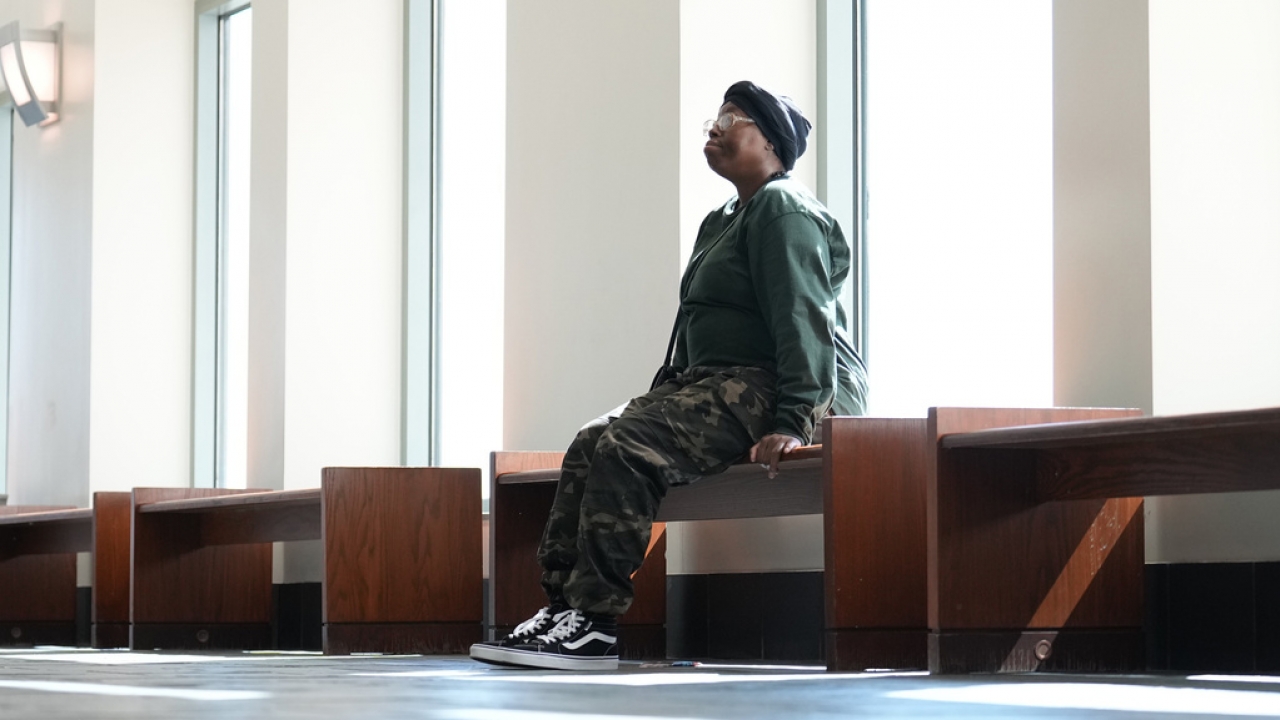 Sheneen McClain, mother of Elijah McClain, sits outside the courtroom at the Adams County Justice Center.