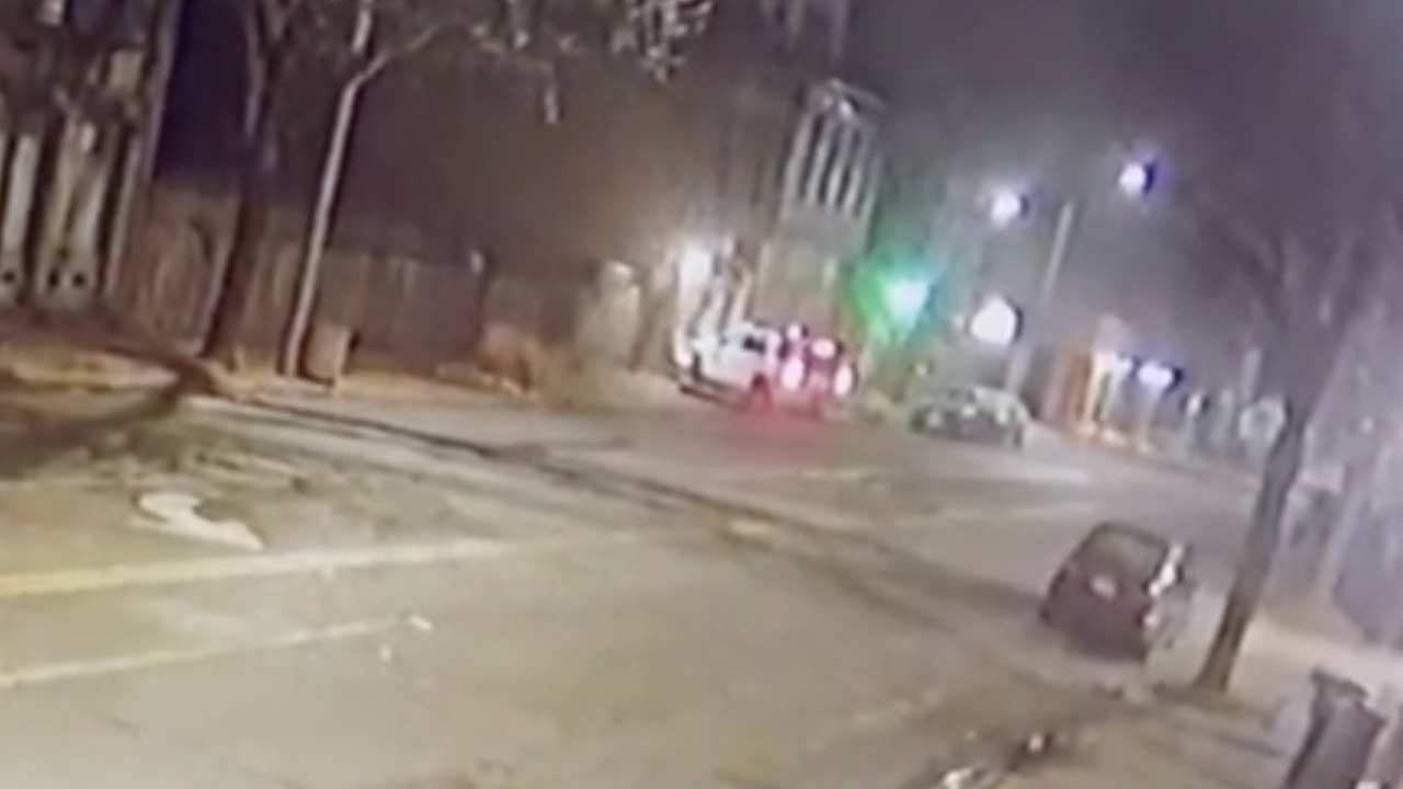 A picture from surveillance video that shows a police cruiser crashing into a gay bar.