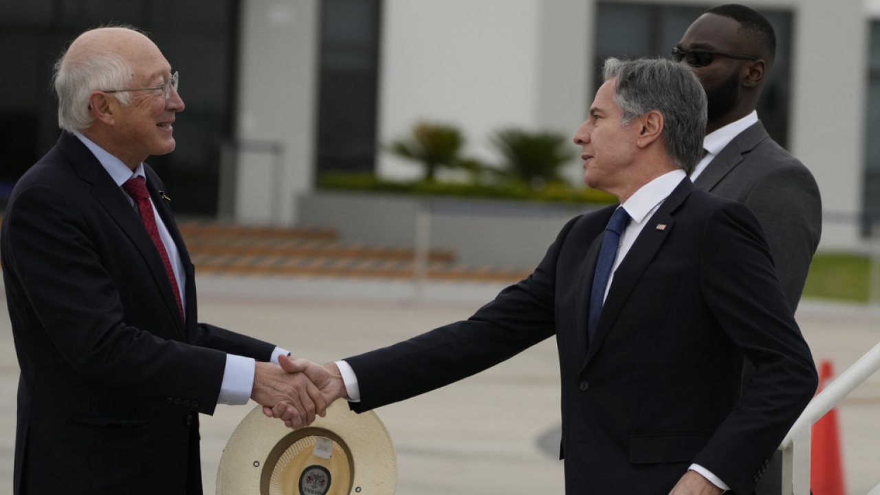 U.S. Secretary of State Antony Blinken, right, shakes hands with U.S. Ambassador to Mexico Ken Salazar.