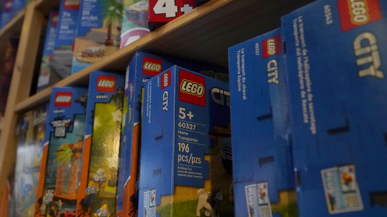 Lego toys and items are displayed at a store.
