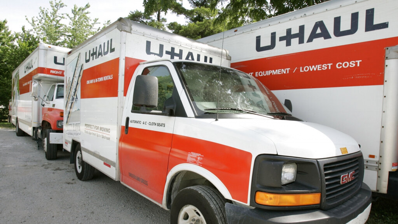 U-Haul trucks sit on a lot in Des Moines, Iowa.