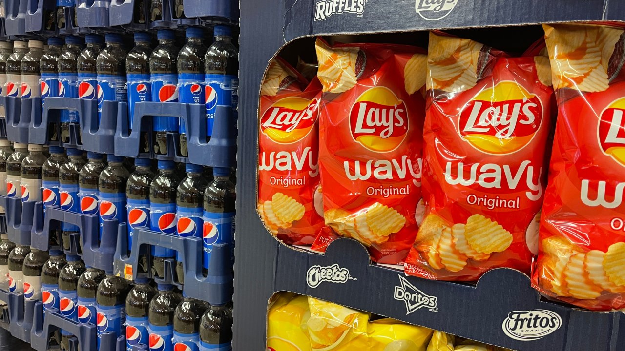 Pepsi and Lay's products on supermarket shelves