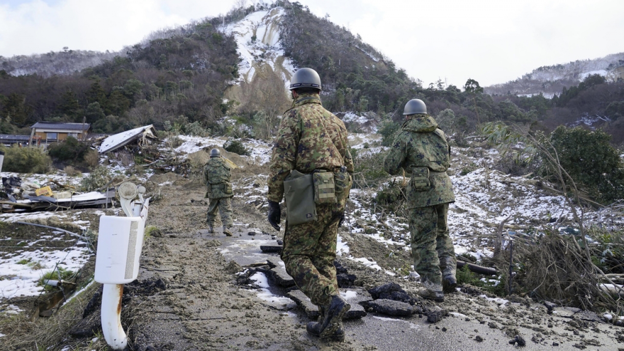 Members of Japan Self Defense Force search a landslide area in the earthquake-hit city Suzu, Ishikawa prefecture