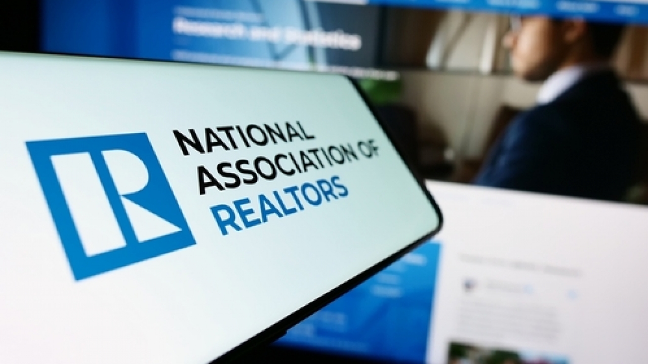 Smartphone showing logo of the National Association of Realtors.