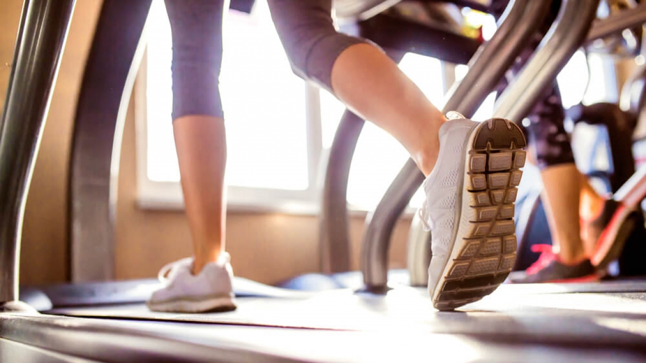 Generic image of a woman running on a treadmill.