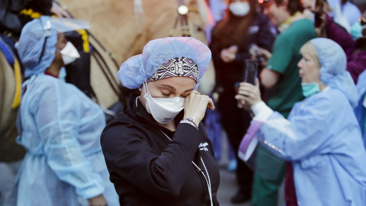 Medical workers wear protective gear