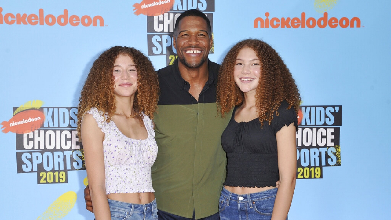 Michael Strahan, center, and his daughters Sophia Strahan, left, and Isabella Strahan, right.