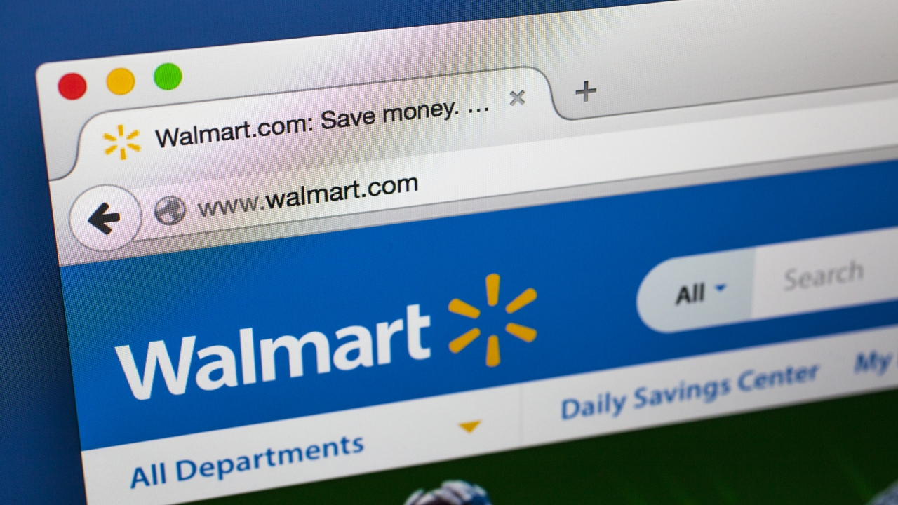 Walmart's website is shown on device screens.