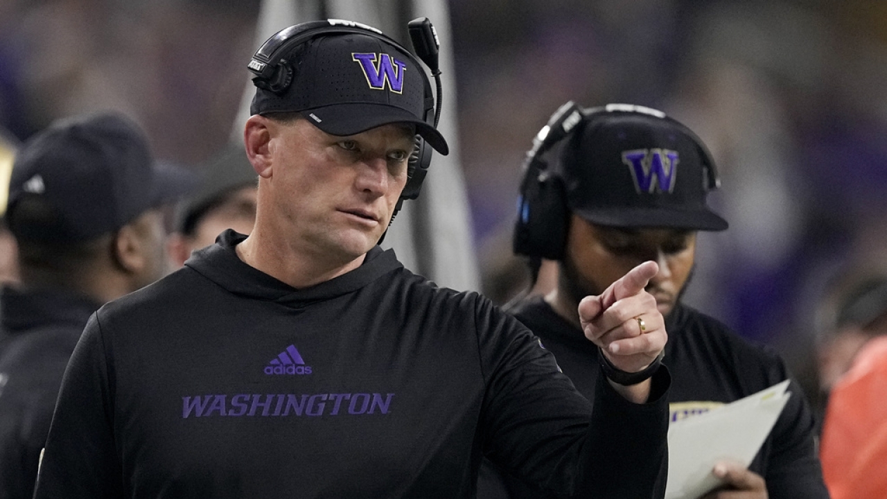Washington head coach Kalen DeBoer watches during the first half of the national championship NCAA College Football Playoff