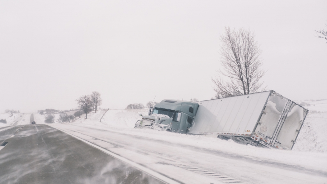 A crashed semi truck sits abandoned along Interstate 80 in central Iowa on Saturday, Jan. 13, 2024.