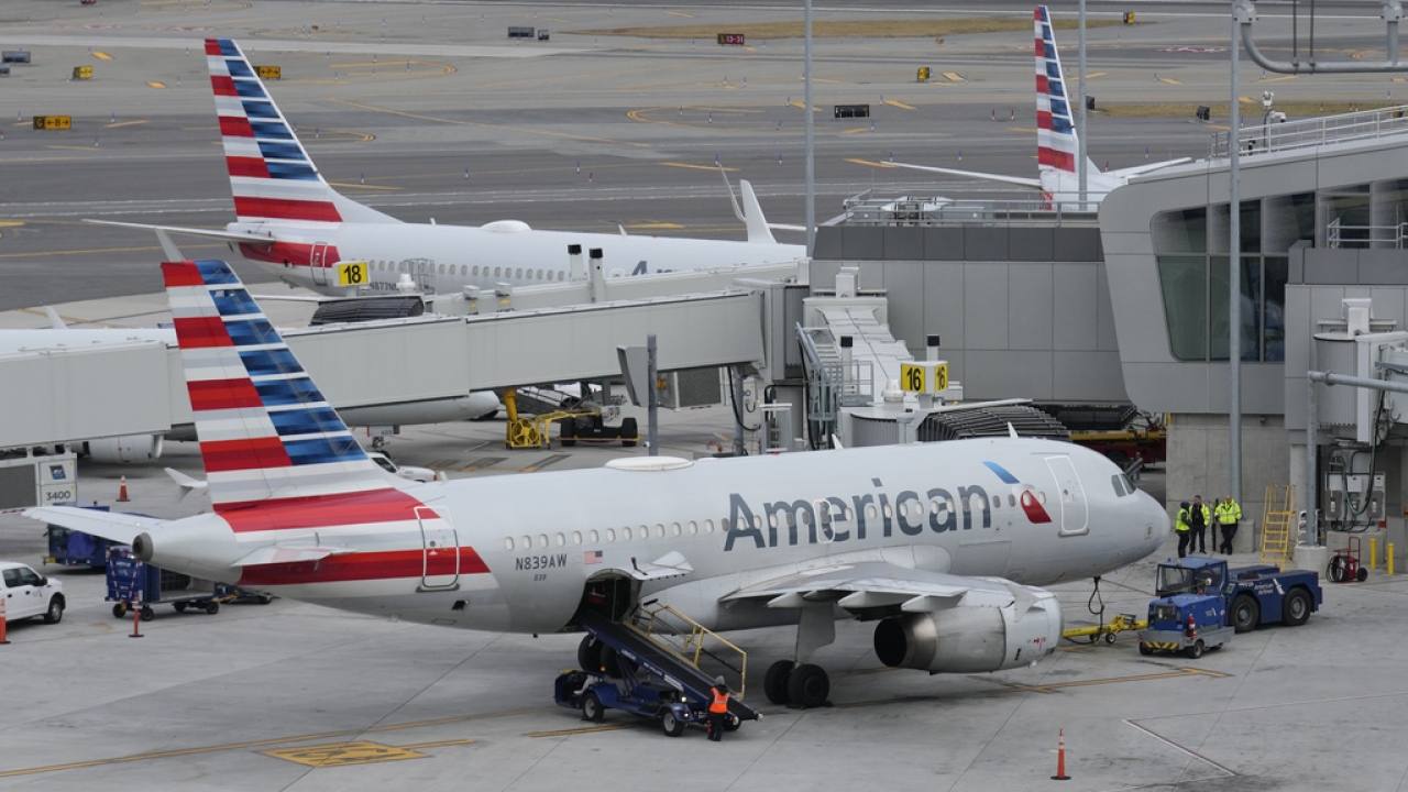 Generic images of American Airlines planes sitting on a tarmac.
