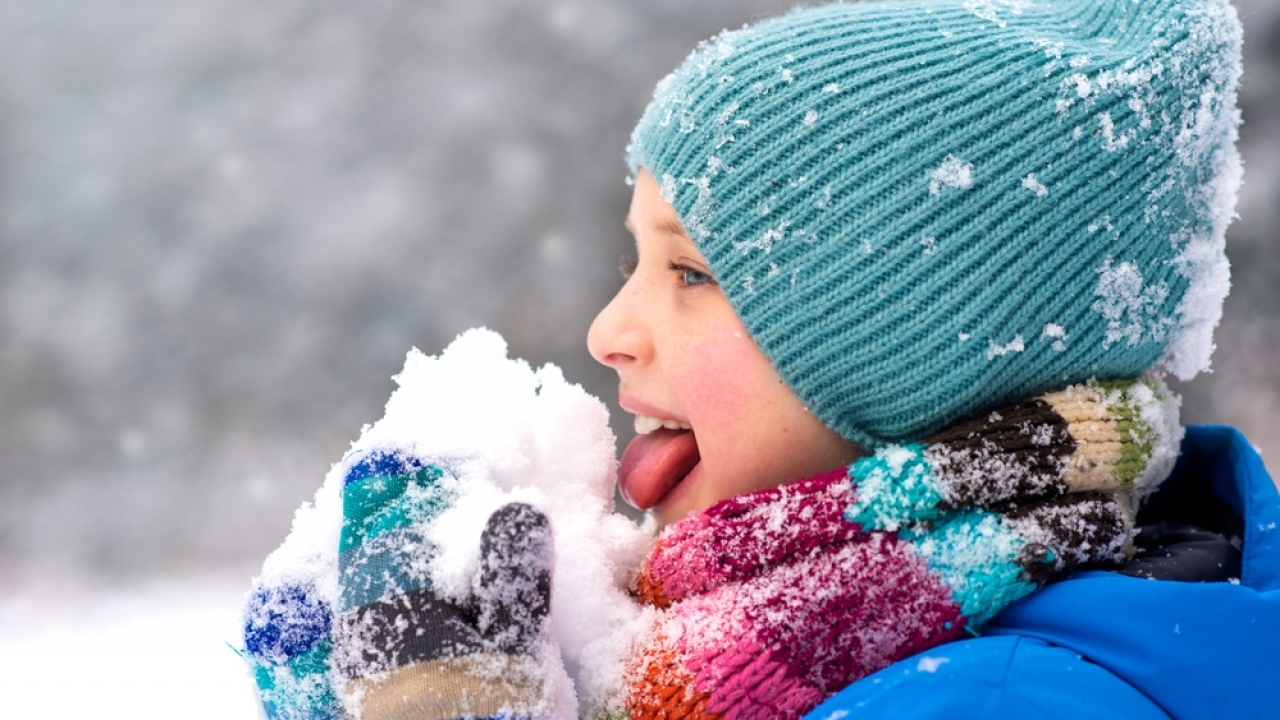 Child eating snow
