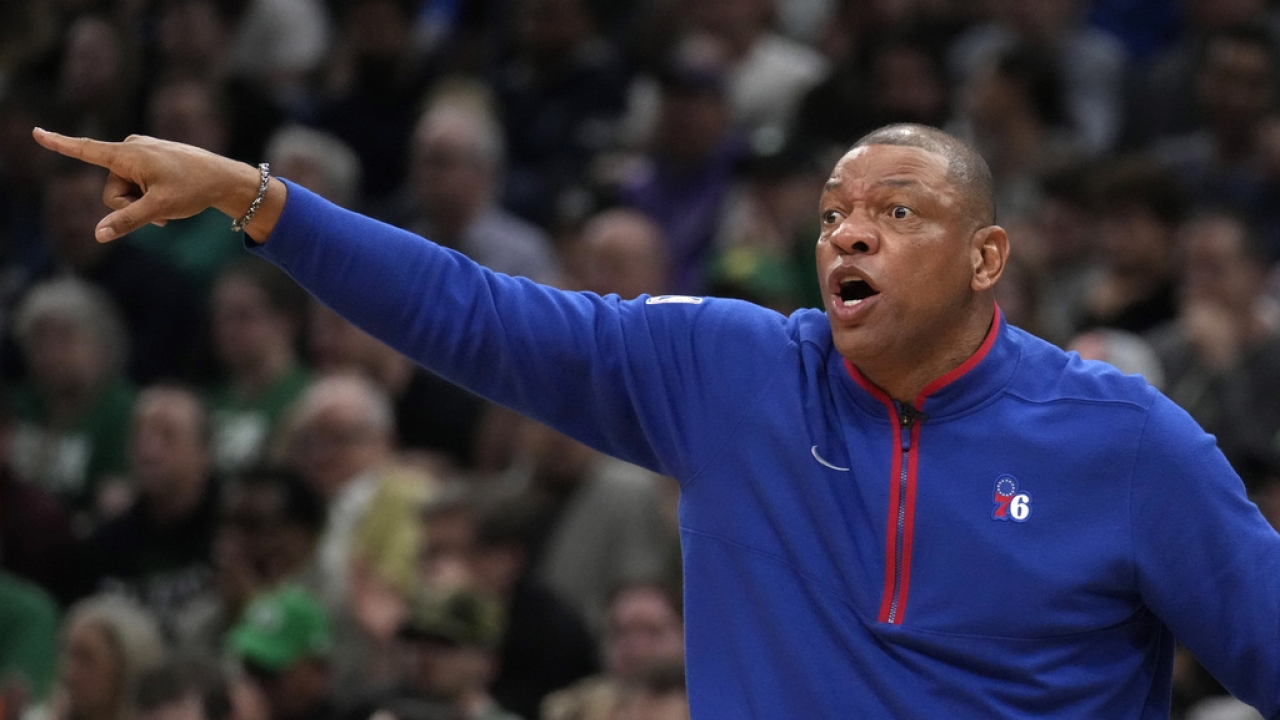 Former Philadelphia 76ers head coach Doc Rivers calls to his players during the first half of a 2023 playoff game.