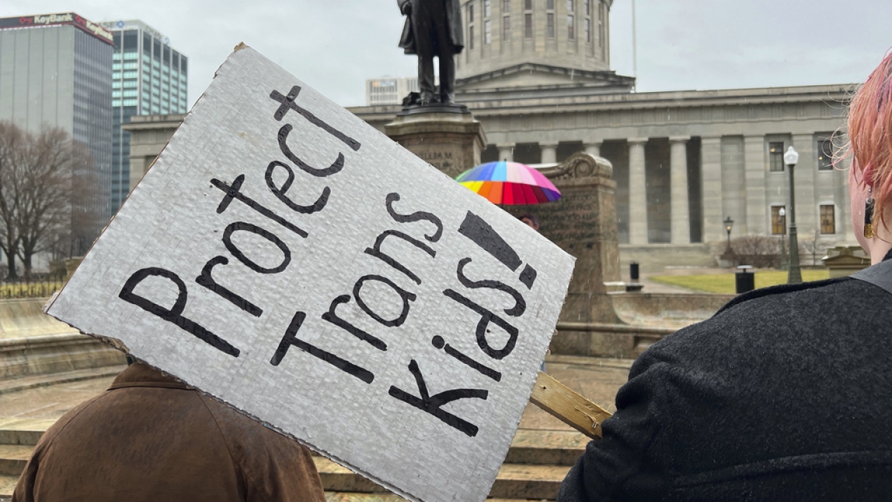 Transgender rights activists rally outside the Ohio statehouse