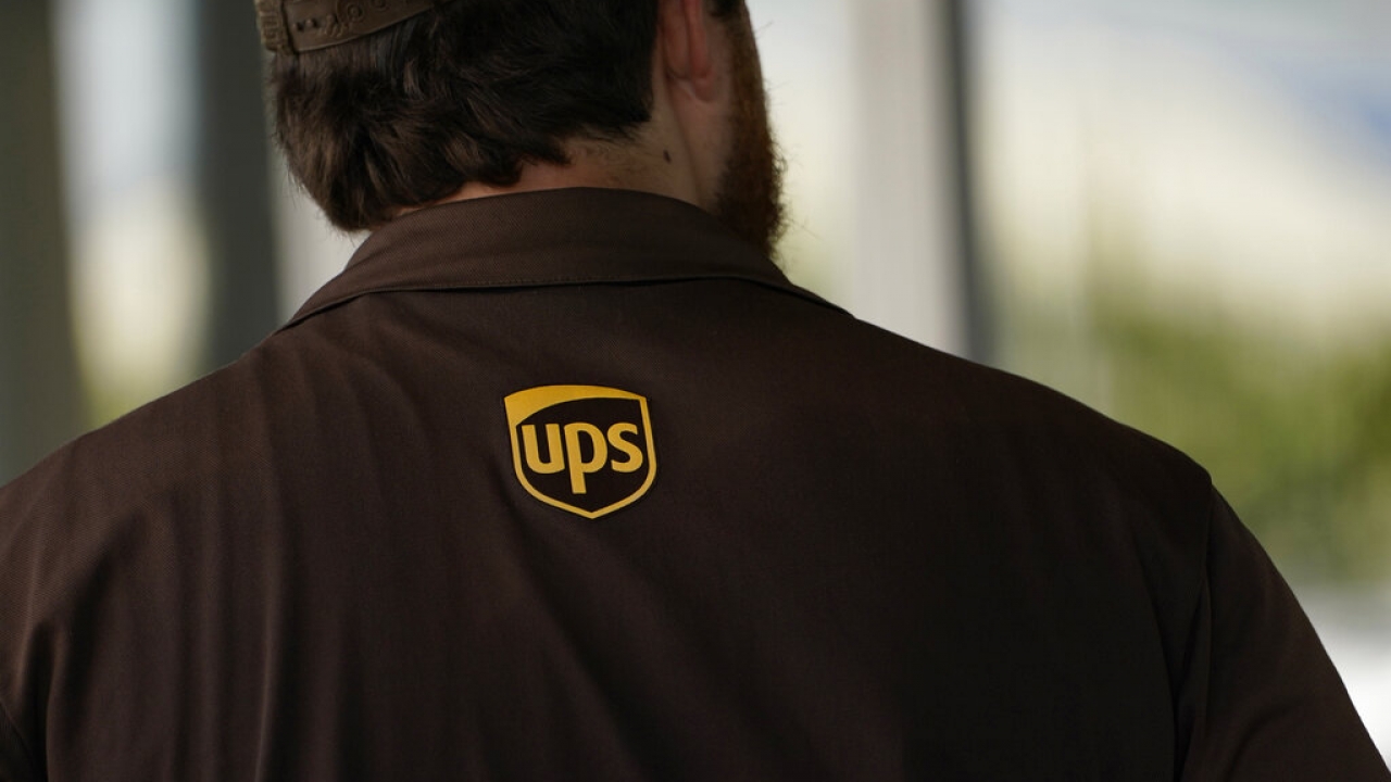 UPS logo on the back of an employee's shirt