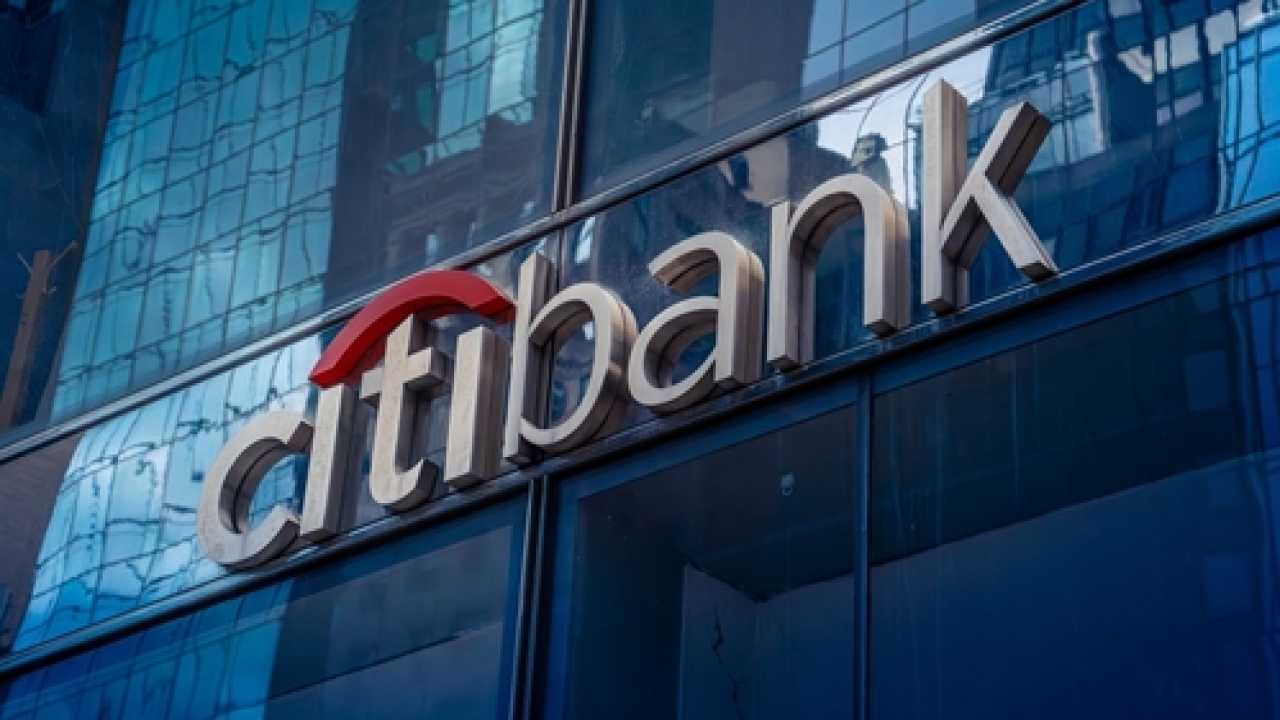 Citibank logo on a glass building.