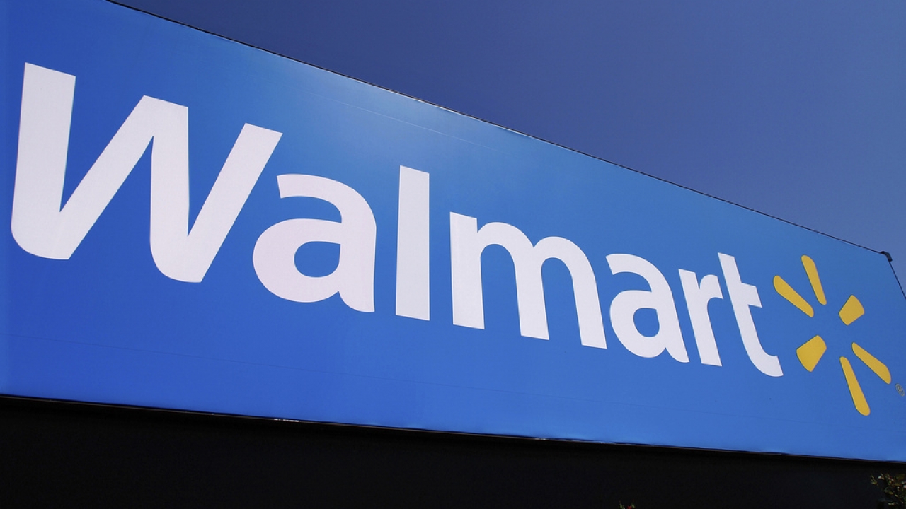 The Walmart logo displayed on a store.