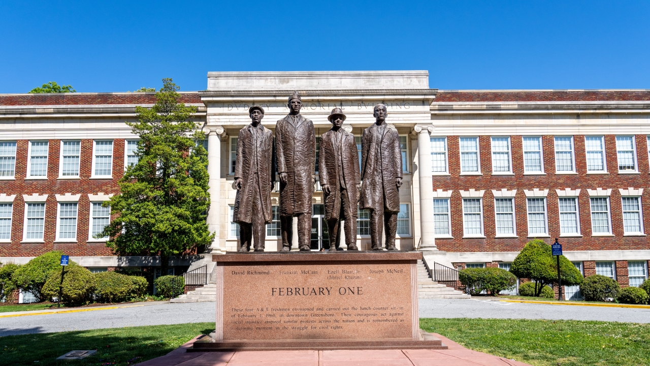 "February One" sculpture, by James Barnhill, is a monument dedicated to the Greensboro Four from the Woolsworth sit in.