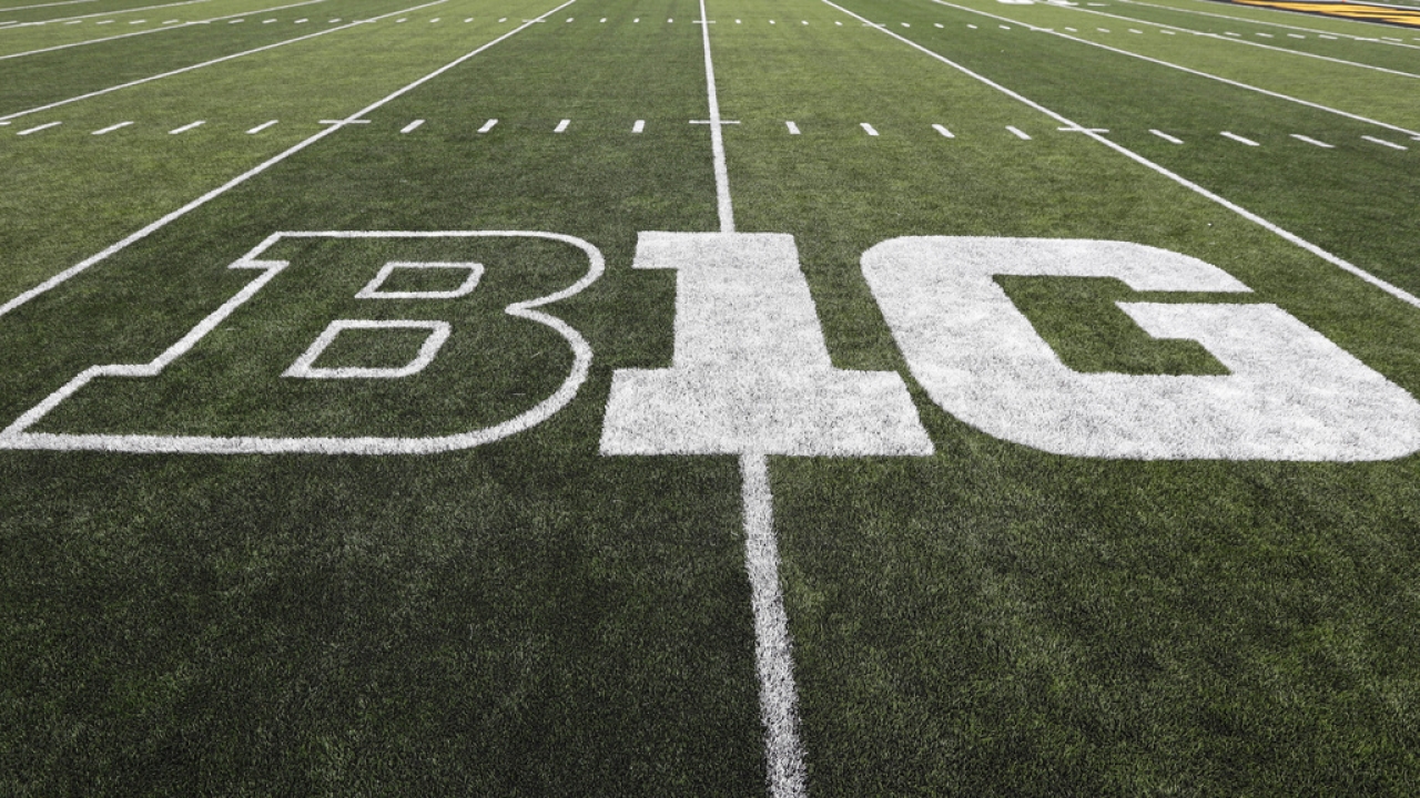 The Big Ten logo is displayed on the field before an NCAA college football game.