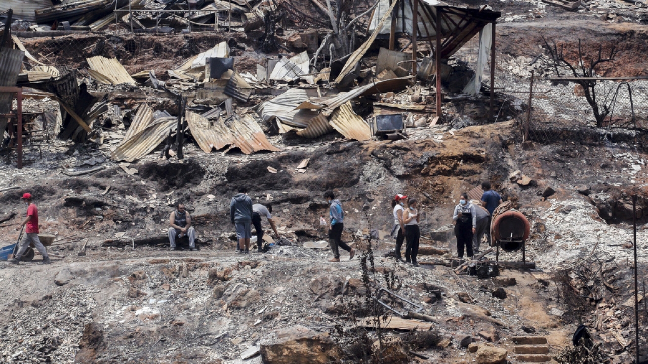 The rubble of burned houses from a wildfire in Vina del Mar, Chile.