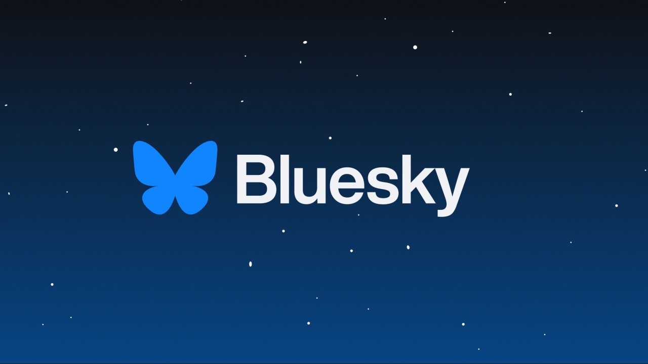 Bluesky's blue butterfly logo over a starry background