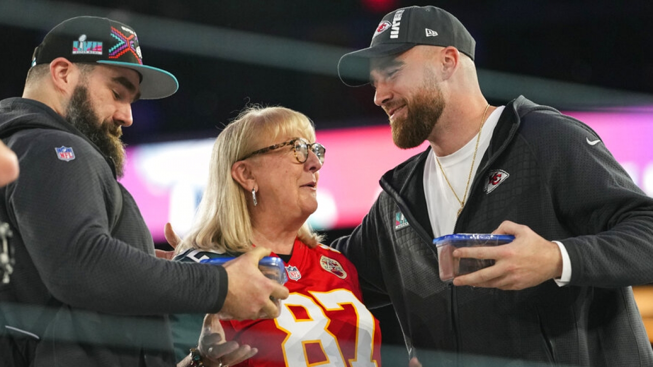 Kansas City Chiefs tight end Travis Kelce embraces mother Donna.