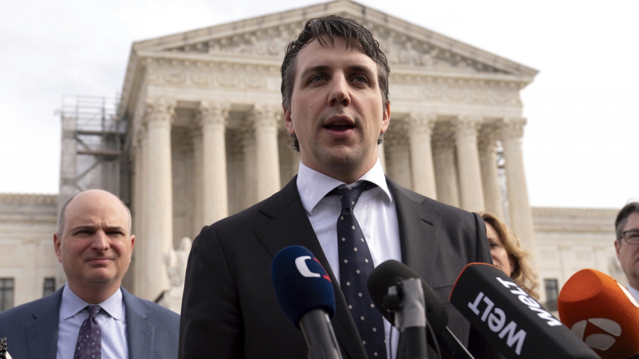 Jason Murray speaks with the media after the court hearing outside of the U.S. Supreme Court.