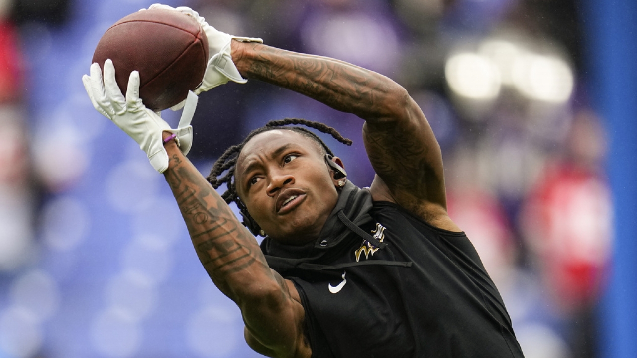 Baltimore Ravens wide receiver Zay Flowers catches a football.