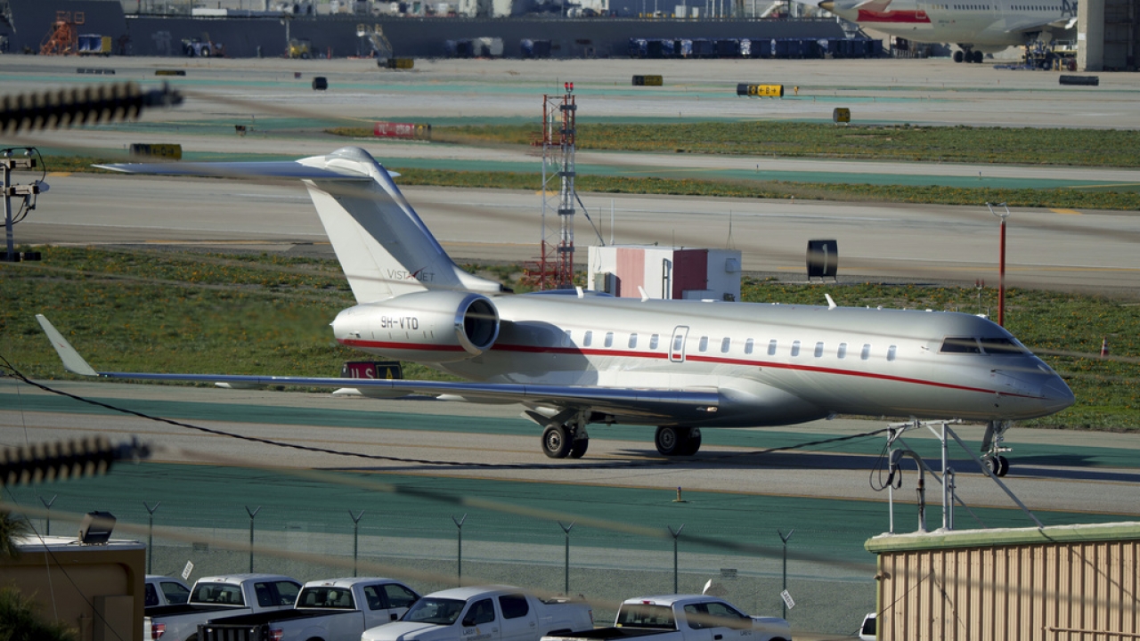 A VistaJet private jet, dubbed "The Football Era," thought by online sleuths to have Taylor Swift aboard lands at LAX.f