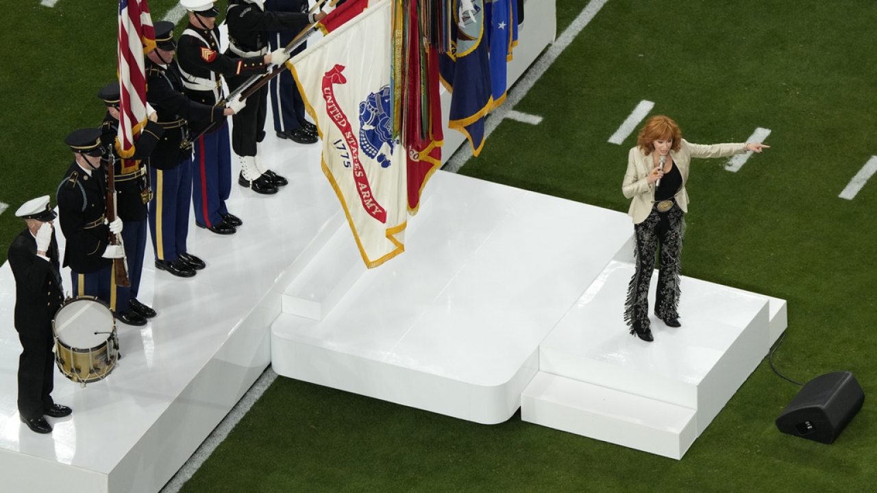 Reba McEntire performs the national anthem before the NFL Super Bowl 58.