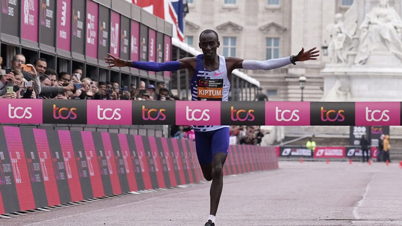 Kelvin Kiptum finishing the 2023 London Marathon, setting a course record.