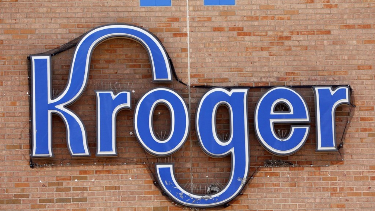 A Kroger sign on a store.