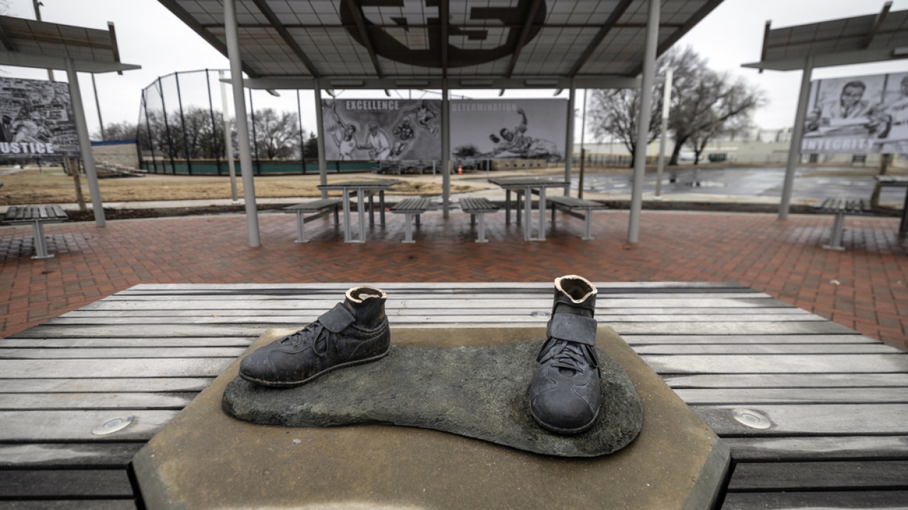 Only shoes remain from a Jackie Robinson statue that was stolen from a park in Wichita, Kansas