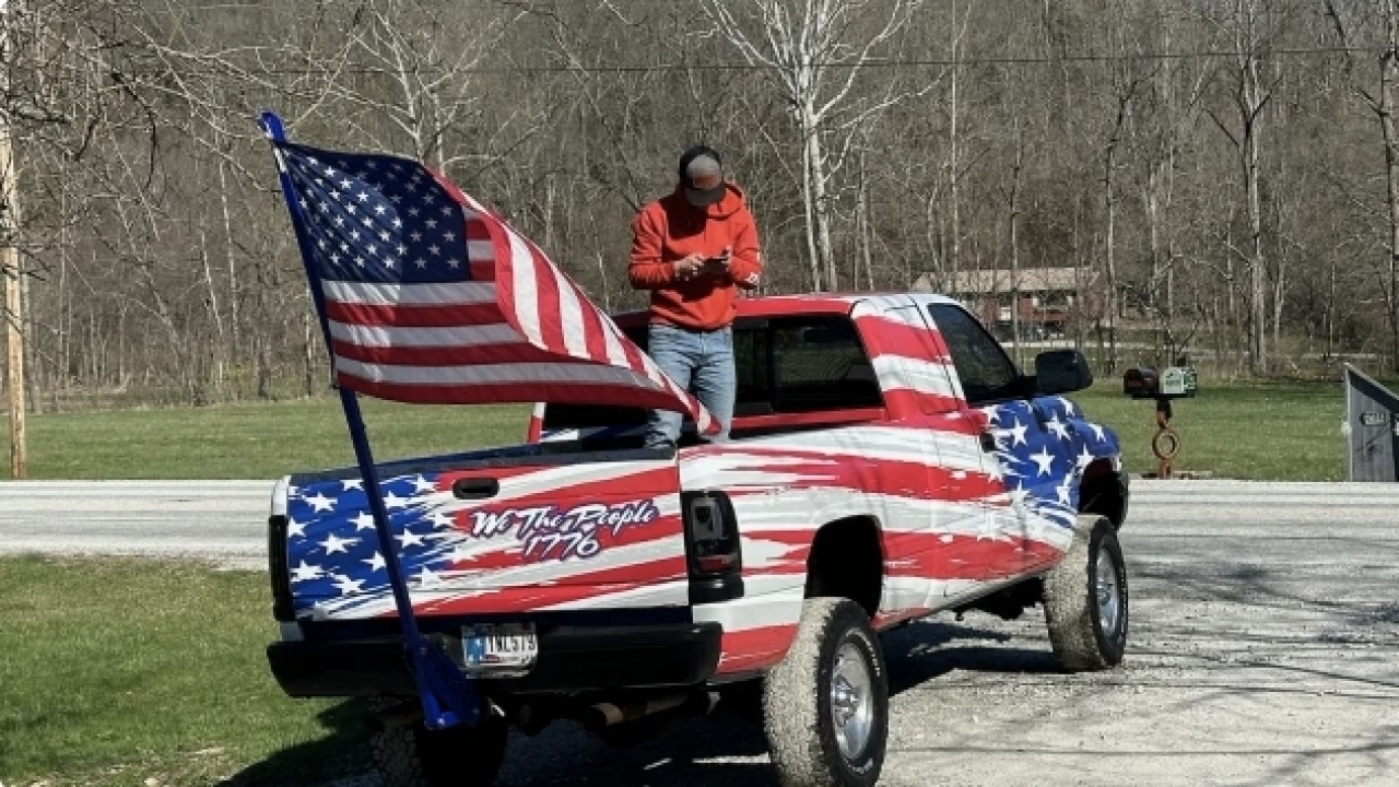 After being told to remove US flag from truck, student doubles down