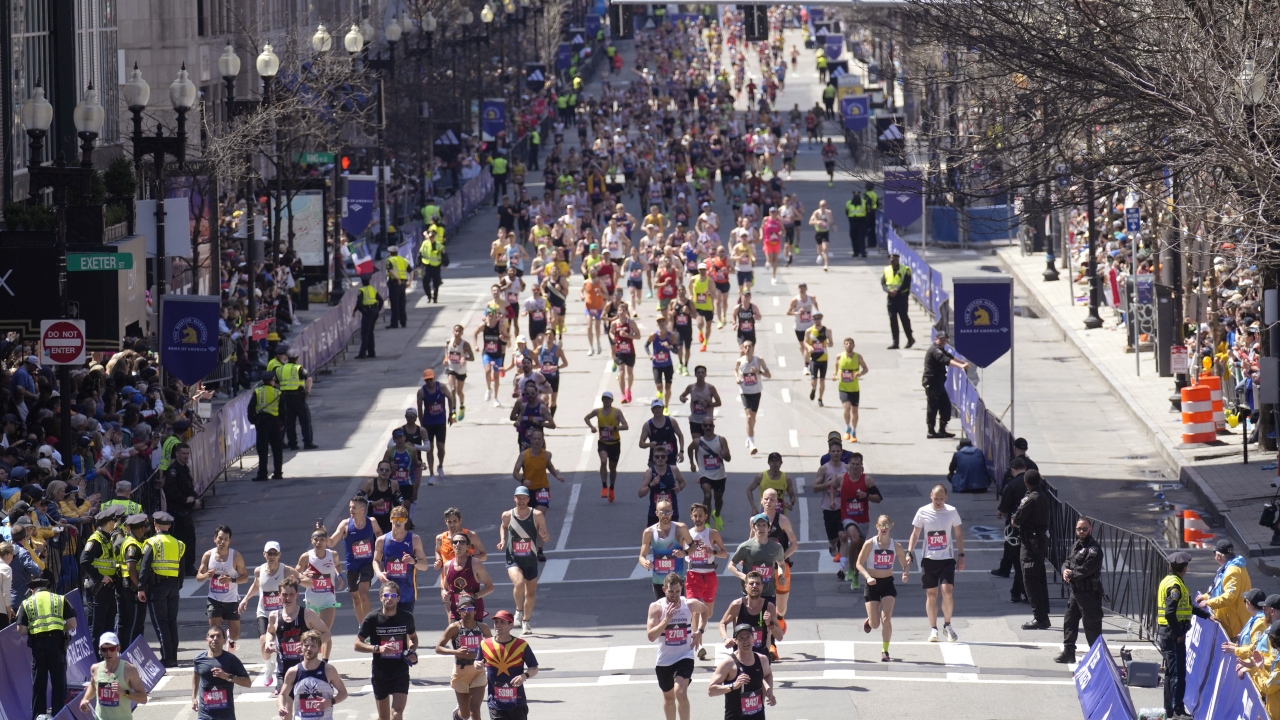 Golden retrievers gather ahead of Boston Marathon to honor Spencer
