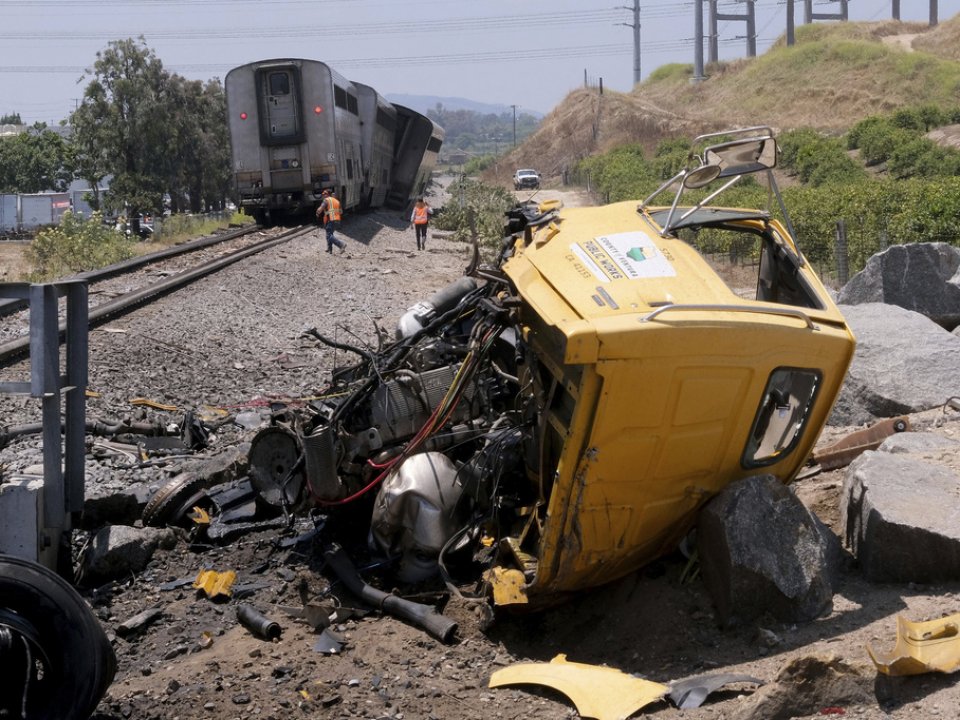 Amtrak train with 198 passengers hits truck, derails in California