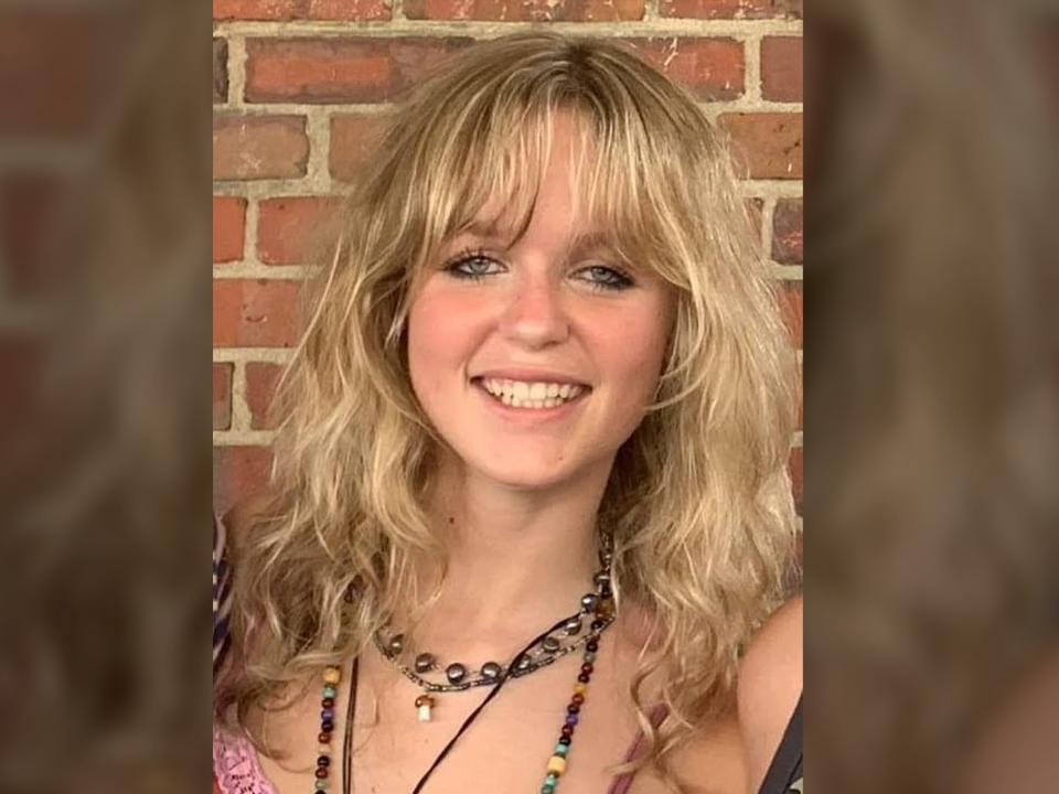 College freshman shot in head by stray bullet while walking on a track